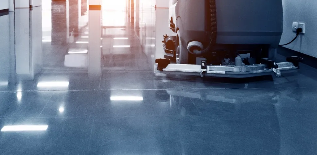 AS Nettoyage — machine professionnelle sur sol brillant